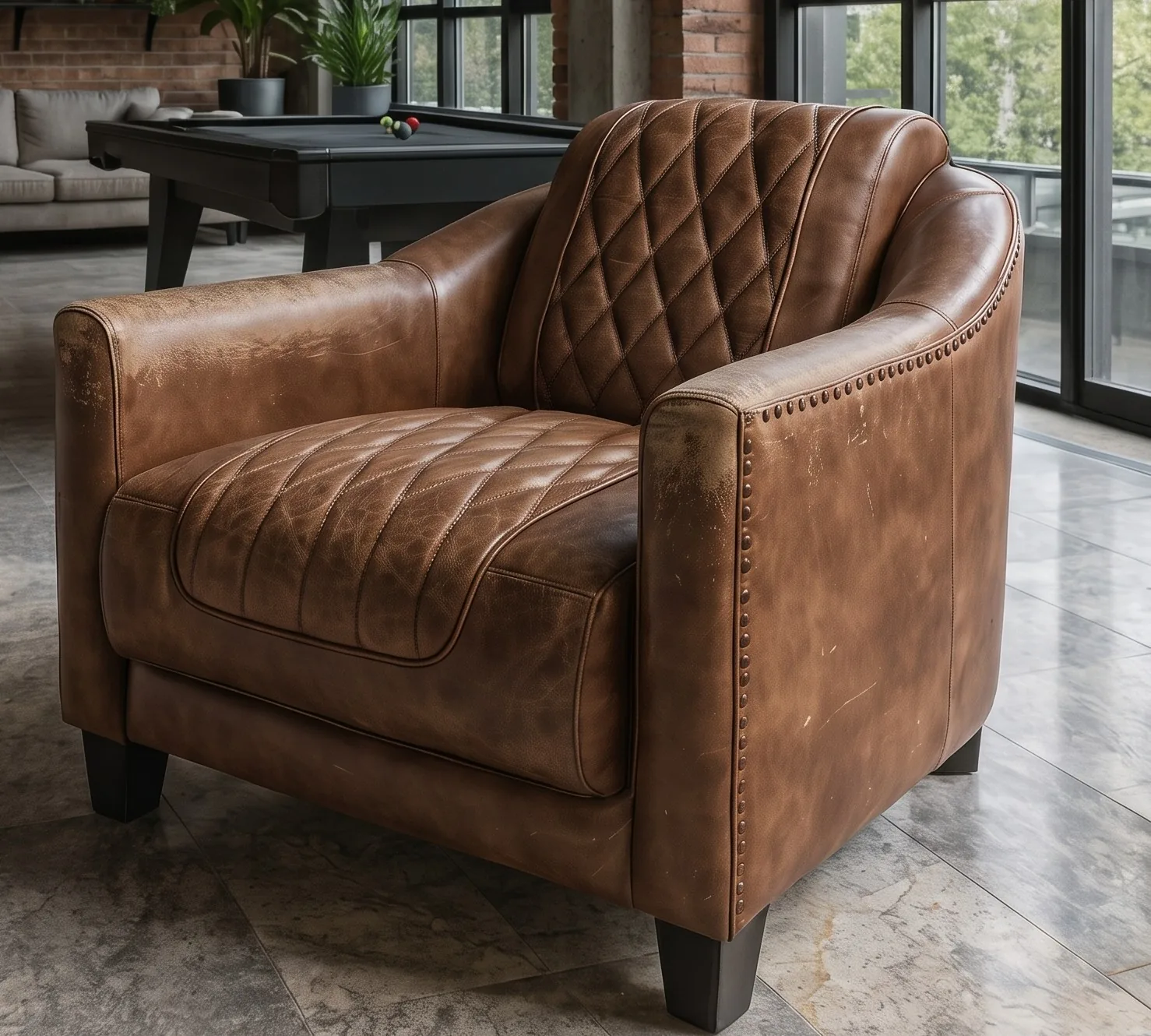 Faded brown leather club chair before recolour